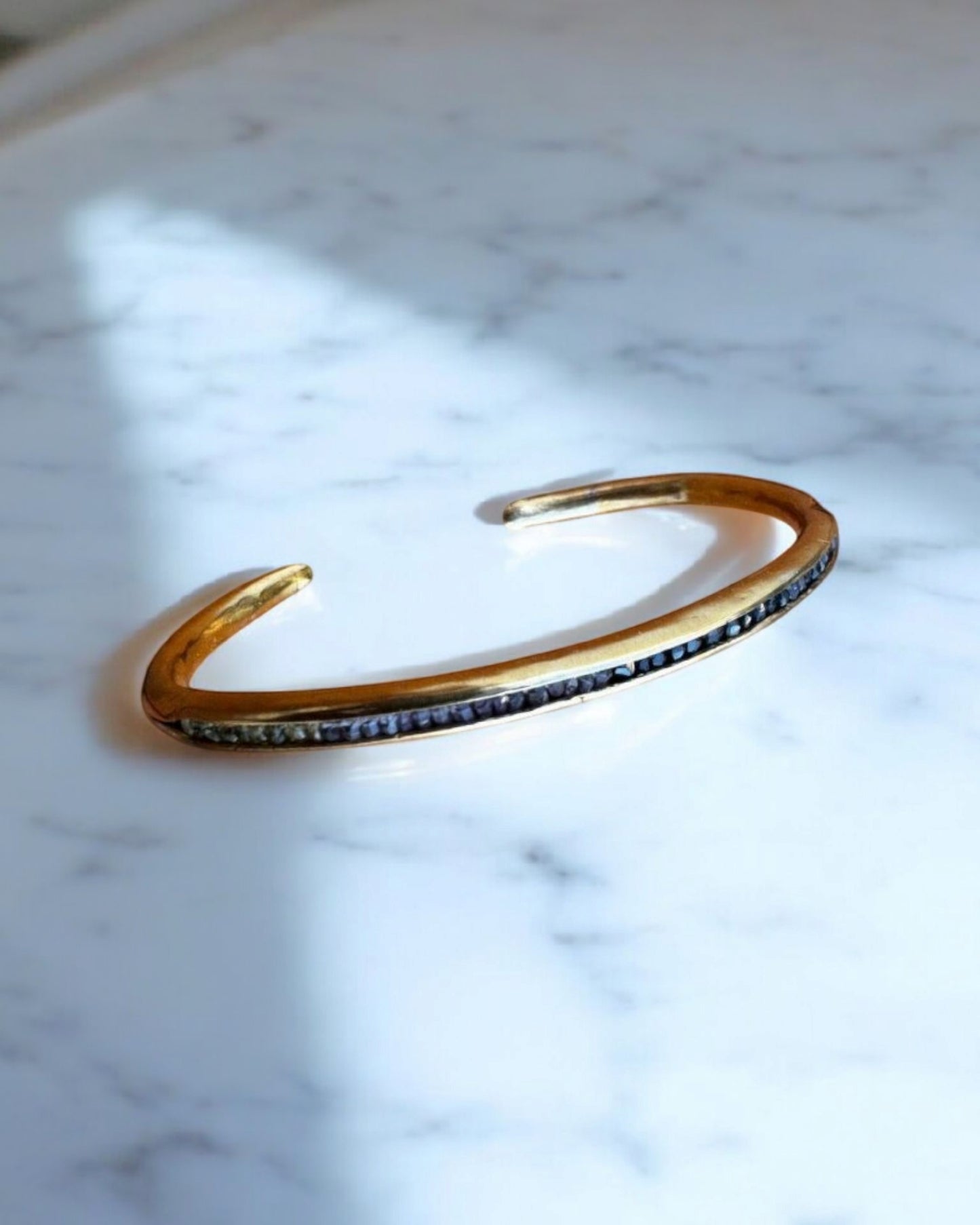 Golden Bangle Sapphire Bracelet: A Minimalist Touch of Luxury