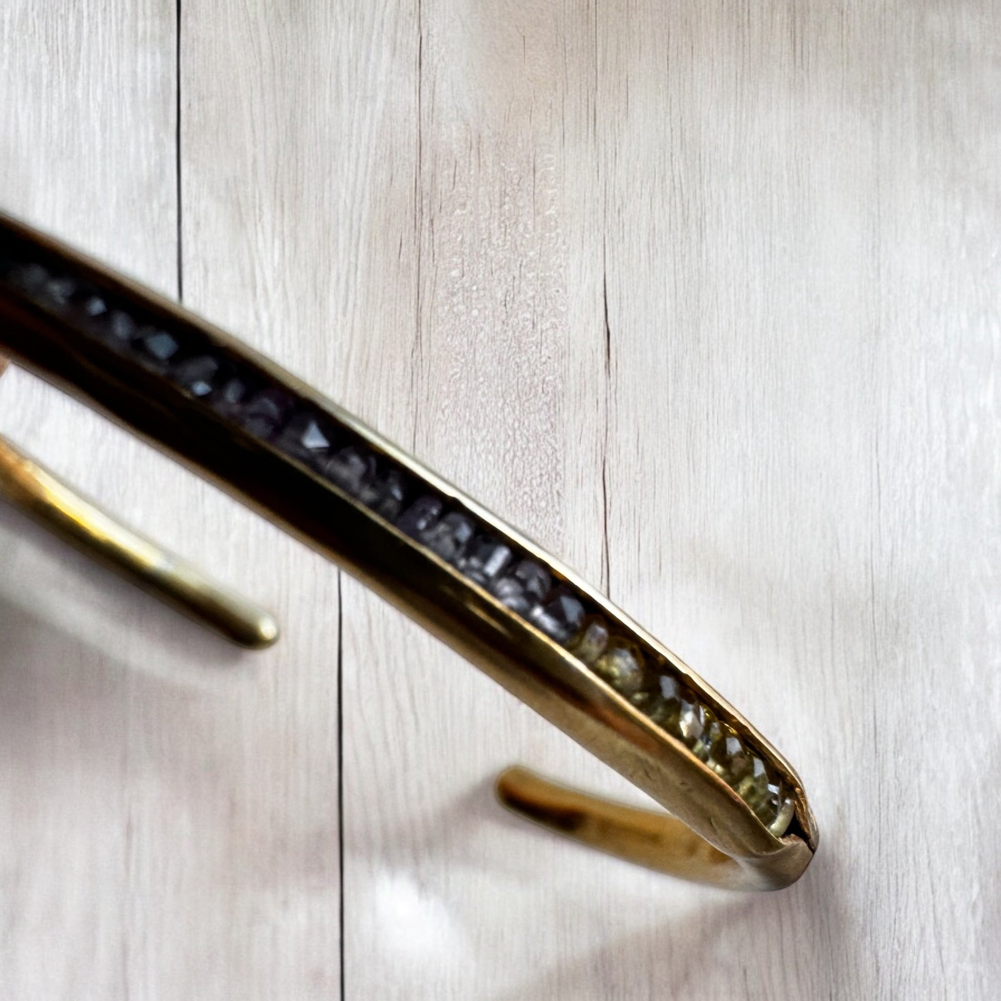 Golden Bangle Sapphire Bracelet: A Minimalist Touch of Luxury