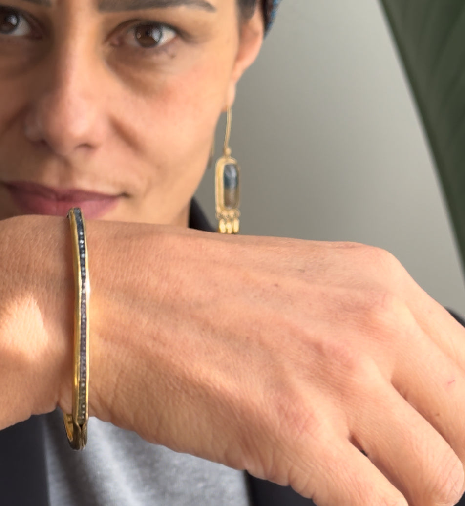 Golden Bangle Sapphire Bracelet: A Minimalist Touch of Luxury