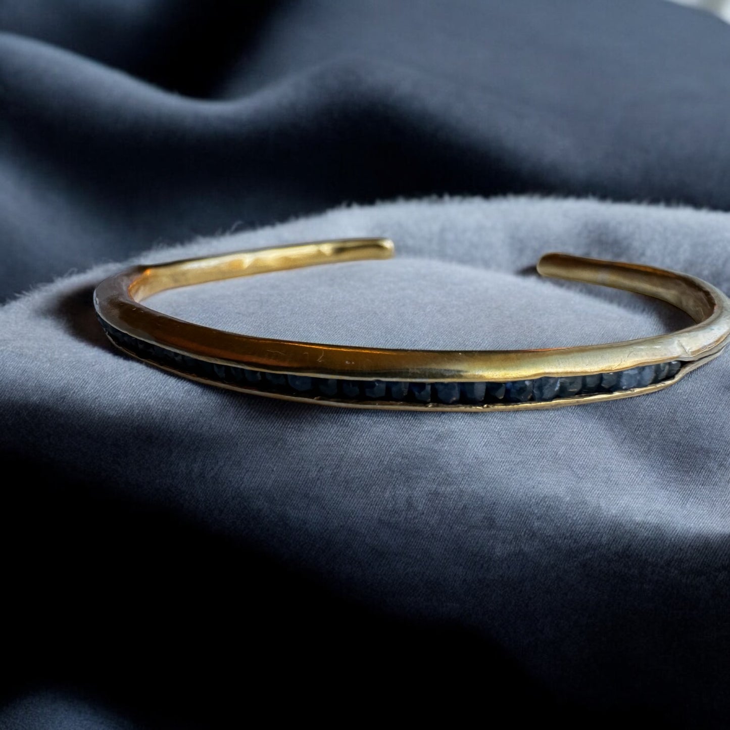 Golden Bangle Sapphire Bracelet: A Minimalist Touch of Luxury