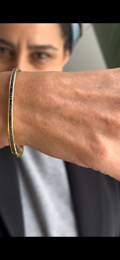 Golden Bangle Sapphire Bracelet: A Minimalist Touch of Luxury