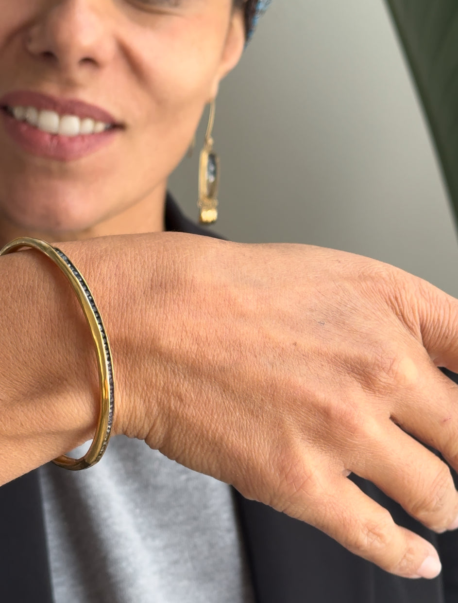 Golden Bangle Sapphire Bracelet: A Minimalist Touch of Luxury