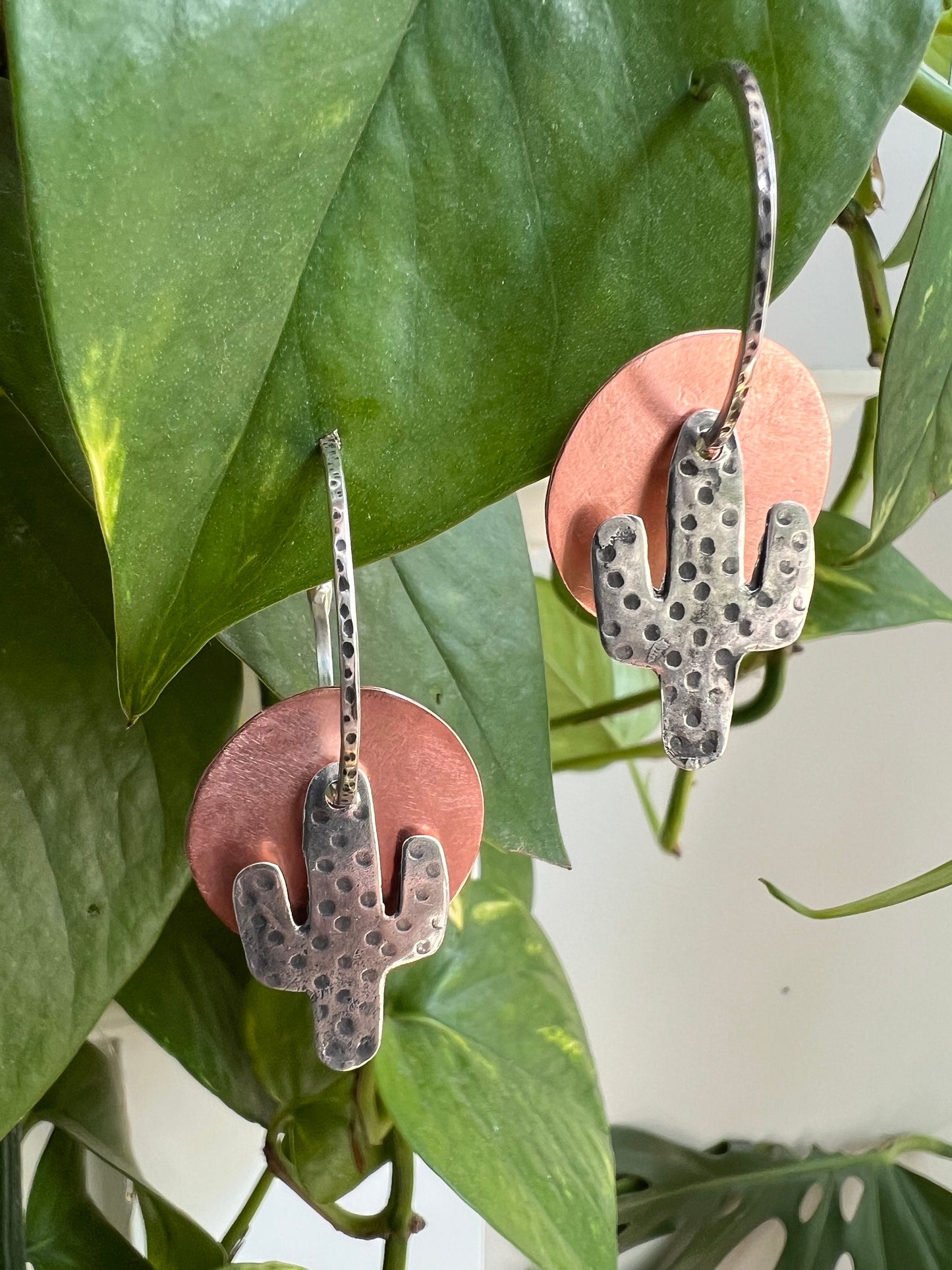 Handcrafted Cactus dangle earrings. Silver and copper.