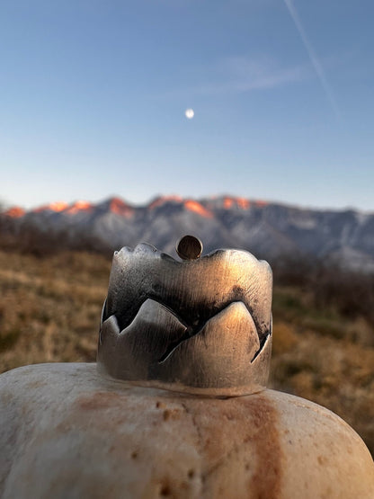 Experience the beauty of the outdoors with our solid sterling silver and 14k gold Mountain ring. Perfect for mountain enthusiasts, this special piece celebrates the adventurous lifestyle.